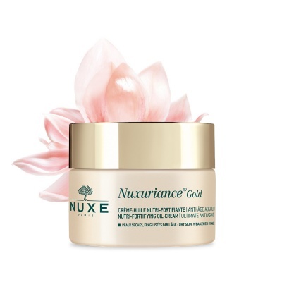 Creme Nuxuriance Gold Nuxe com flor rosa pálido