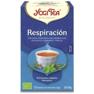 Embalagem azul de Yogi Tea Respiración com copo de chá e plantas verdes