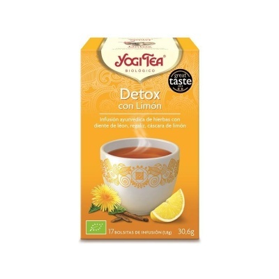 Caixa de chá Yogi Tea Detox con Limón com chá numa chávena, limão e flores amarelas