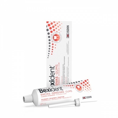 Pasta dentífrica Bexident para gengivas em embalagem branca com pontos vermelhos e texto em vermelho e preto