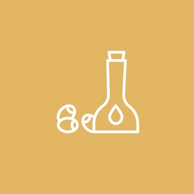 Desenho branco de garrafa com gotas e duas nozes em fundo mostarda