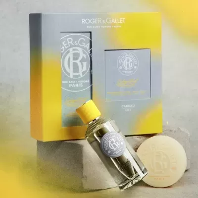 Conjunto Roger & Gallet com frasco de perfume e sabão em embalagem amarela e cinza