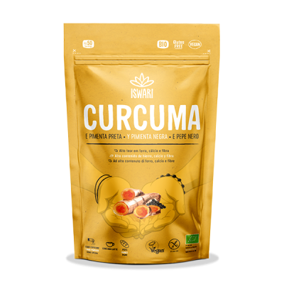Embalagem amarela de cúrcuma e pimenta preta da marca ISWARI com texto e ícones bio, vegan, e livre de glúten.