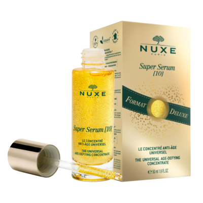 Frasco de sérum dourado NUXE Super Serum [10] com caixa dourada ao fundo