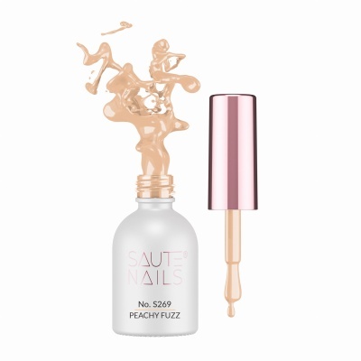 Frasco de verniz de unhas cor pêssego com tampa rosa metalizada.