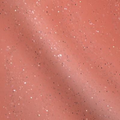 Verniz de unhas cor salmão com brilhos prateados e escritura SAUTE NAILS