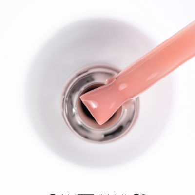 Pincel verniz unhas pêssego em frasco branco com tampa prateada e texto SAUTE NAILS®