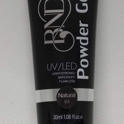 Embalagem preta de gel em tubo com texto branco RND Powder Gel UV/LED Natural 03