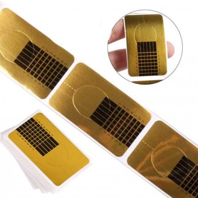 Etiquetas adesivas douradas para unhas com padrão preto