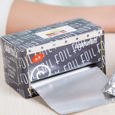 Caixa preta com papel de alumínio a sair e texto FOIL repetido