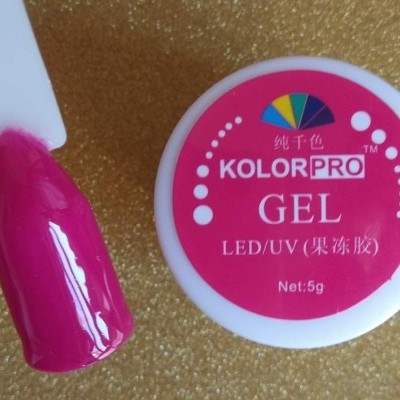 Gel para unhas KOLORPRO em embalagem branca e rosa com amostra rosa brilhante