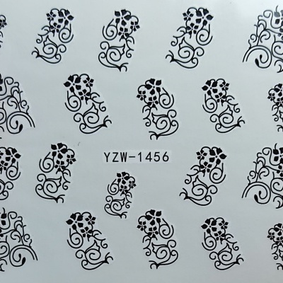Folha com decalques pretos de desenhos florais e texto YZW-1456