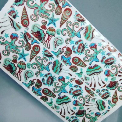 Adesivos de unhas com desenhos de conchas, polvos e estrelas do mar coloridos