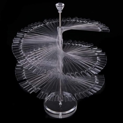 Expositor espiral acrílico transparente sobre fundo preto