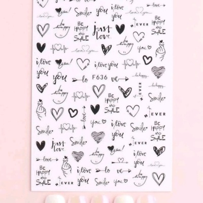 Folha decorativa para unhas com frases e desenhos em preto e cinco unhas decoradas.