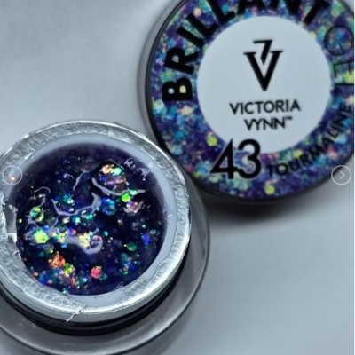 Pote de verniz roxo com glitter holográfico da marca Victoria Vynn com tampa etiquetada