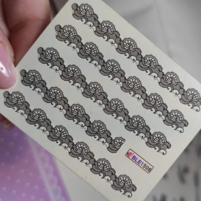 Folha de autocolantes decorativos rendilhados pretos em fundo branco com etiqueta BLE1500d