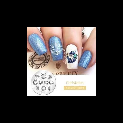 Unhas pintadas com verniz azul brilhante e desenho em unha branca