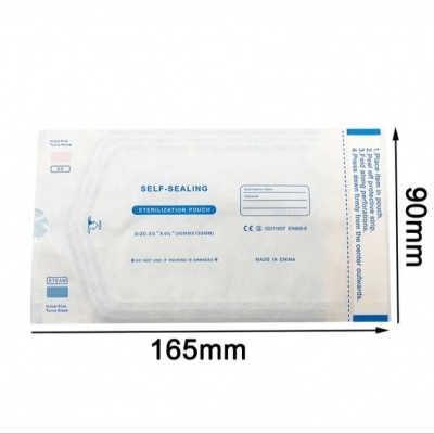 Saco autoclavável branco translúcido com texto azul e medidas 165x90mm