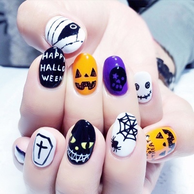Unhas decoradas de Halloween com vários temas e cores