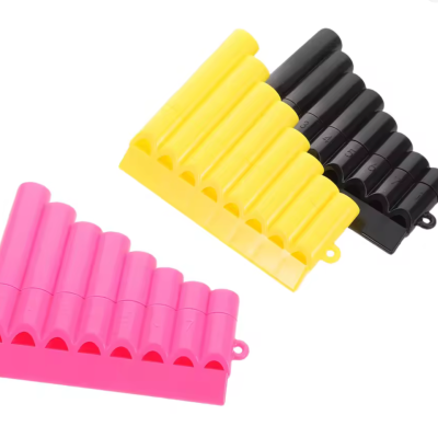 Suportes angulares plásticos em amarelo/preto e rosa para organização com oito compartimentos