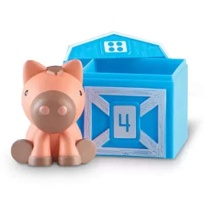 Brinquedo porco rosa e caixa azul com número 4