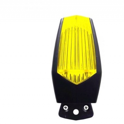 Farol dianteiro de bicicleta preto com lente amarela