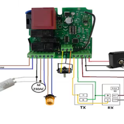 Placa eletrónica verde com componentes e fios coloridos, interruptor preto com chave, texto técnico no fundo