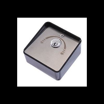 Dispositivo quadrado preto com superfície metálica e botão no centro