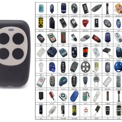 Controle remoto preto com quatro botões ao lado de cartaz com vários modelos de controles remotos