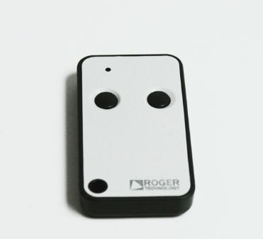 Comando remoto branco e preto ROGER Technology com três botões circulares