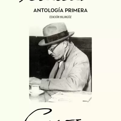 Book cover titled ANTOLOGÍA PRIMERA with photo of a man in a hat reading at a table.
