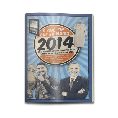 Livro azul O ANO EM QUE EU NASCI 2014 com fotos de Cristiano Ronaldo, Barack Obama e Papa Francisco.