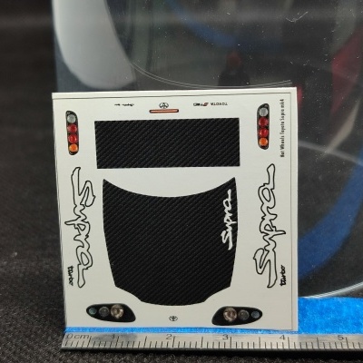 Autocolante para modelo de carro Toyota Supra GT Turbo com régua azul transparente ao lado