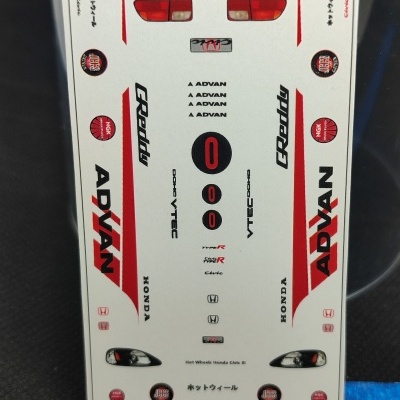 Folha de autocolantes para modelo de carro Hot Wheels Honda Civic Si com várias logos e luzes em fundo branco.