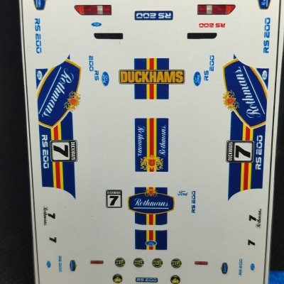 Folha de autocolantes para modelo Hot Wheels Ford RS200 com logos várias marcas e números 7.