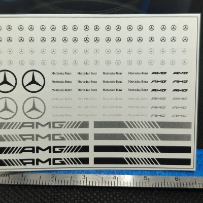 Folha com autocolantes Mercedes-Benz e AMG a preto e régua metálica