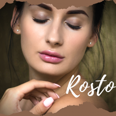 Rosto de mulher jovem com maquilhagem subtil e unhas pintadas