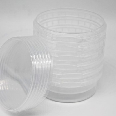 Potes plásticos transparentes empilhados com tampa rosqueável