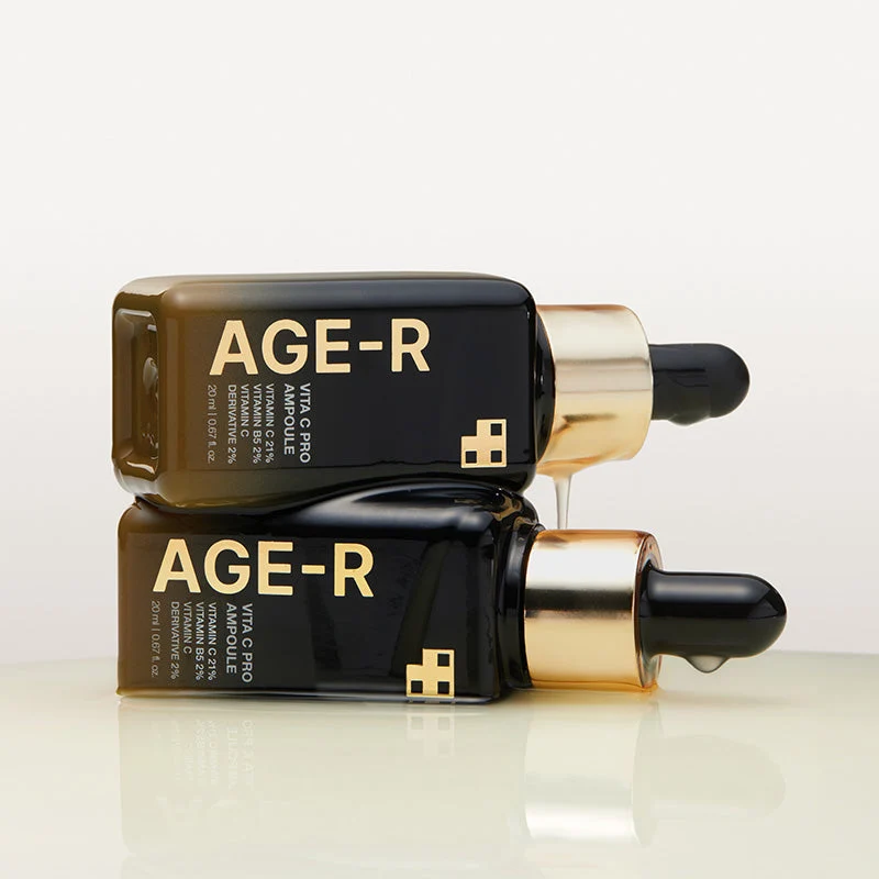 Medicube Age-R Vita C Pro Ampoule 20ml - Skin Care Serum Frascos pretos com tampas douradas e conta-gotas pretos com texto AGE-R