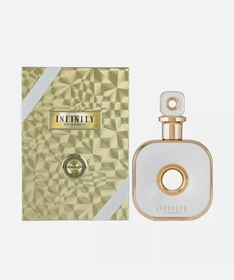 Armaf Infinity Gold Eau De Parfum 105ml Perfume Infinity com frasco transparente e embalagem dourada.