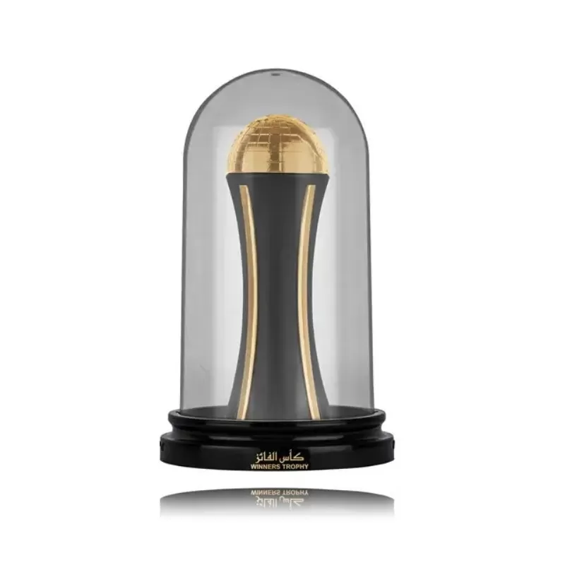Perfume LATTAFA Pride Winners Trophy Gold Edp 100Ml Troféu em vidro transparente com base preta e peça central dourada e preta