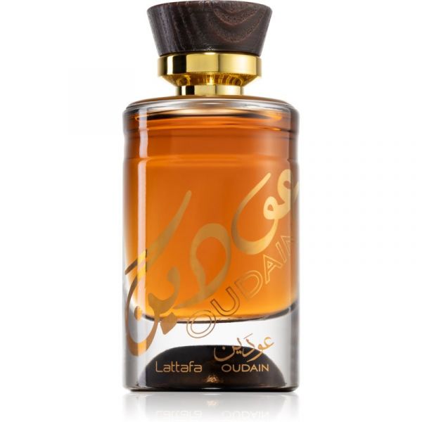 Oudain Lattafa Unissex 100ml (Original) Frasco de perfume âmbar com tampa em madeira e detalhes dourados sobre fundo branco