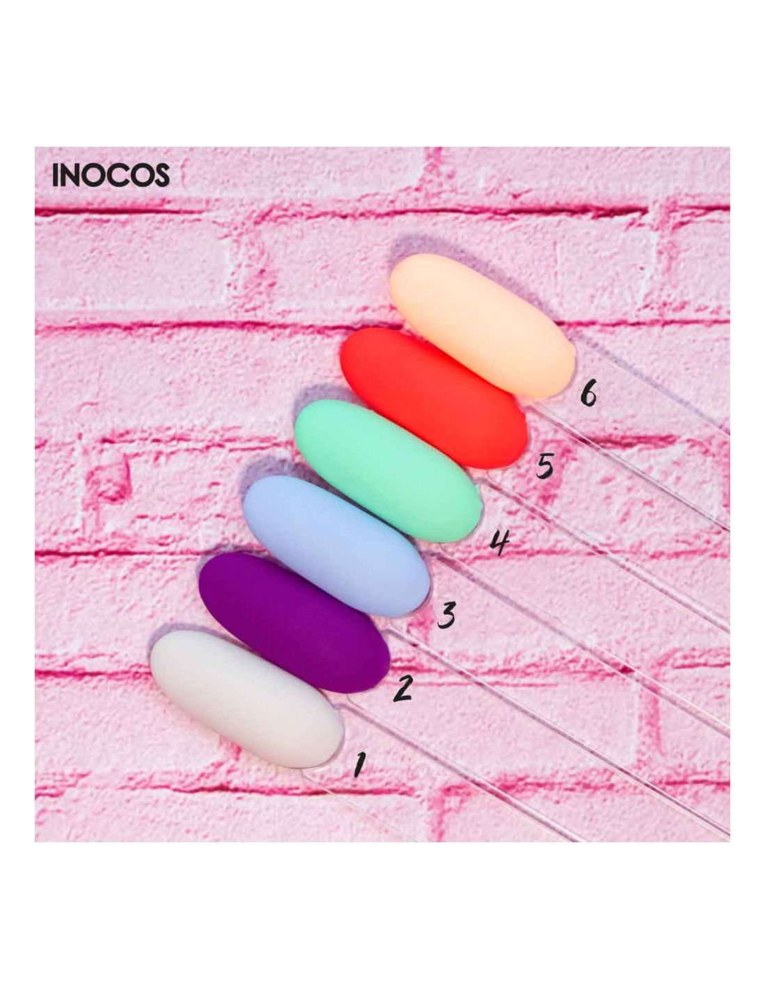 Coleção de Verniz Gel Ser Mulher É F*da INOCOS Amostras de verniz coloridas numeradas de 1 a 6 sobre parede de tijolos rosa