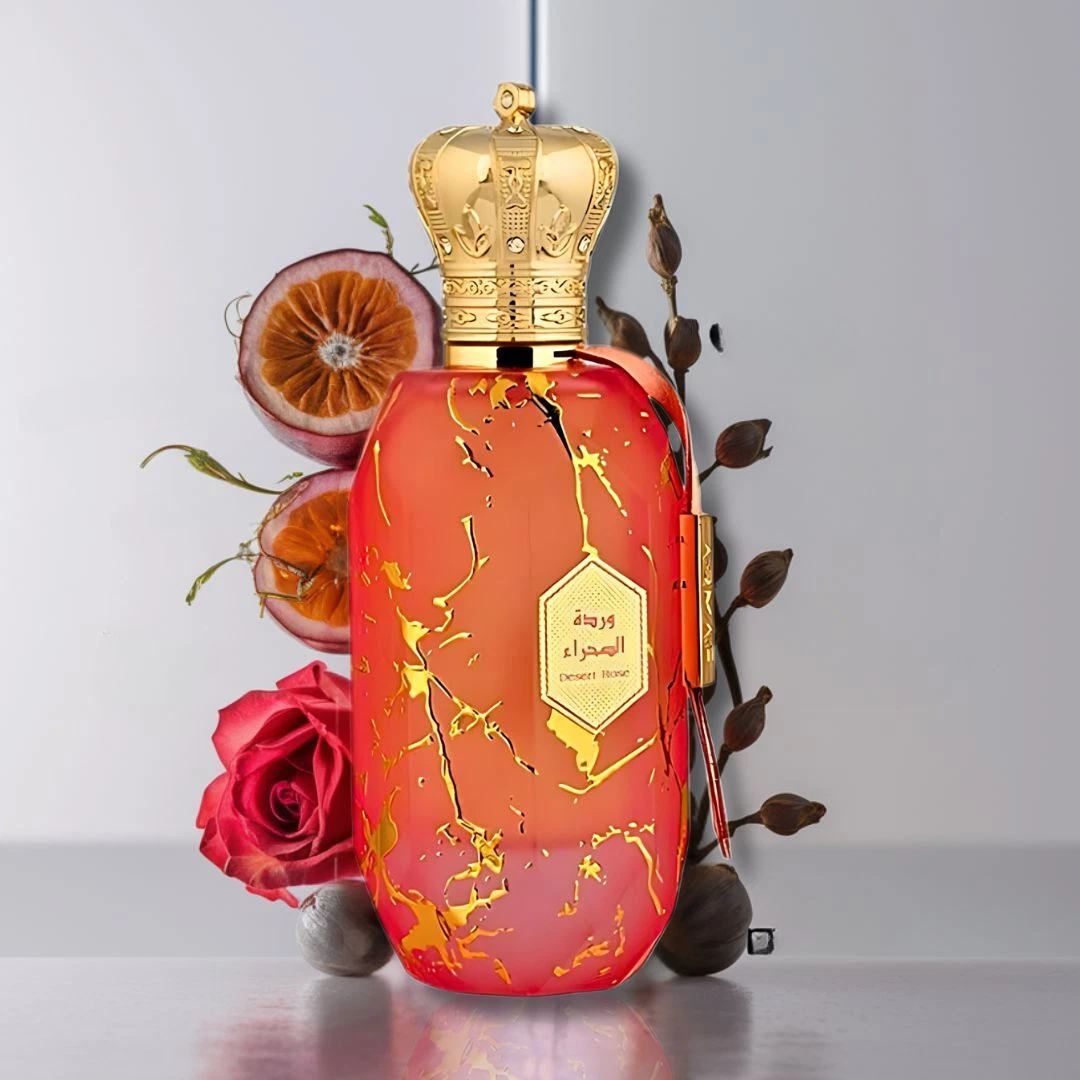Armaf Eter Desert Rose Eau De Parfum 100 ml Frasco de perfume vermelho com tampa dourada em forma de coroa e flores secas ao fundo