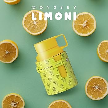 Armaf Odyssey Limoni Fresh Eau de Parfum unissexo 100 ml Frasco de perfume amarelo com embalagem verde decorada, cercado por metades de limão
