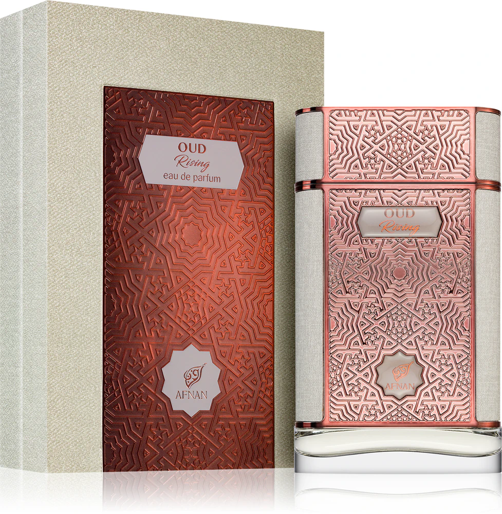 Afnan Oud Rising Eau De Parfum 80ml Frasco de perfume OU Rising Afnan com padrão geométrico em relevo cobre ao lado da sua caixa decorada