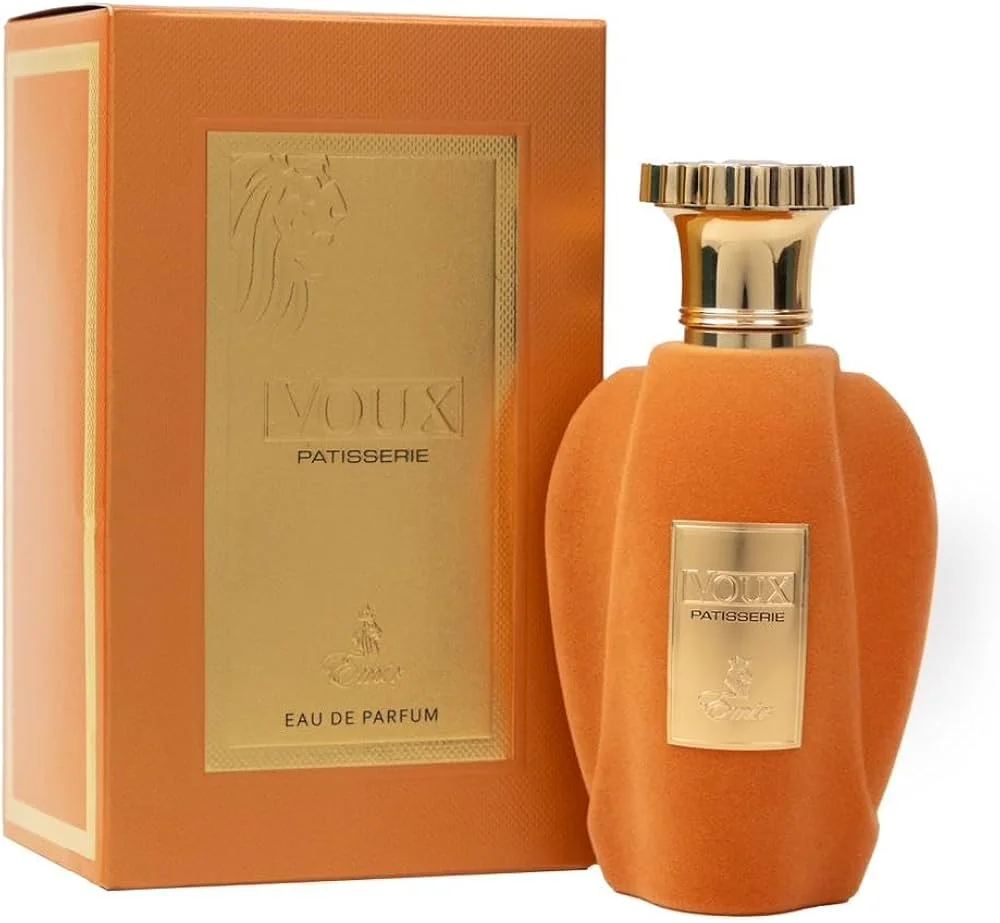 Paris Corner perfume Voux Patisserie Emir 100ml Frasco de perfume laranja aveludado com tampa dourada ao lado de caixa laranja com textos dourados