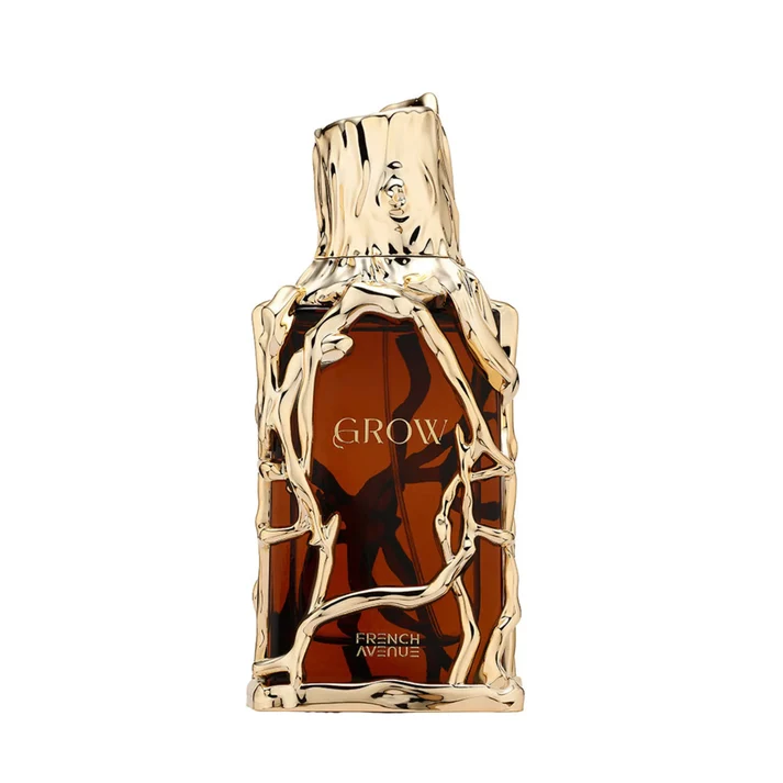French Avenue Grow Eau De Parfum Unisex 100 Ml Frasco de perfume âmbar com decoração dourada em ramos e texto GROW e FRENCH AVENUE