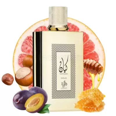 Frasco dourado de perfume KAYAAN GOLD com frutas e mel ao fundo
